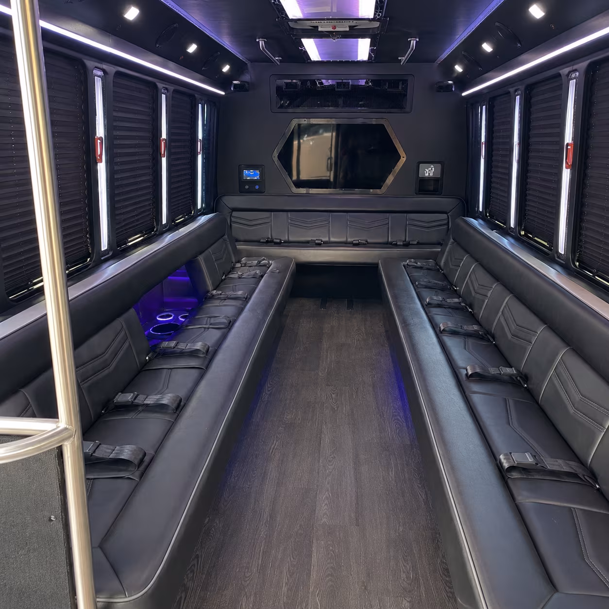 Passenger seating aboard a party bus rental serving Boston
